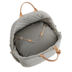 Interior view of a 3-in-1 dog travel bed showing the 2 safety clips and removable padded cushion